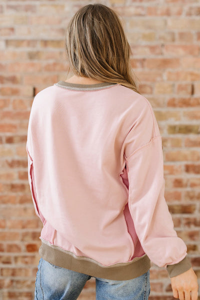Pink Patchwork Exposed Seam Pullover with Contrasting Trim
