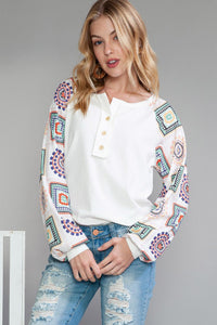 Ribbed White Henley with Colorful Geometric Sleeves