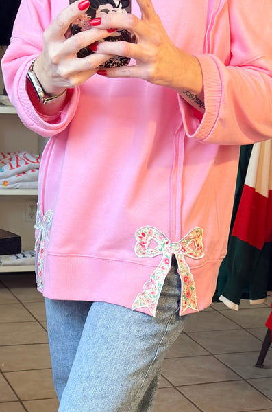 Candy Pink Pullover with Floral Bow Patchwork and Exposed Seams