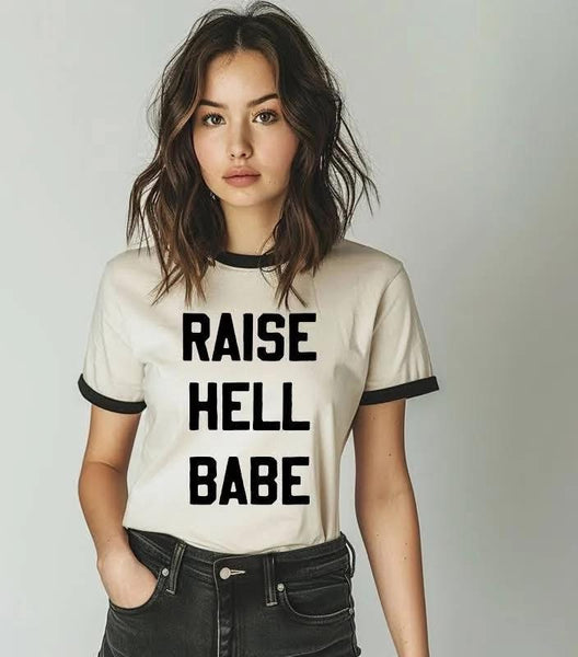 RAISE HELL BABE Graphic Printed on Cream with Black Contrast Trim Tee - Next Level Apparel