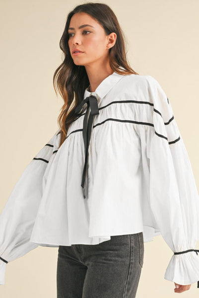 White Long Sleeve Flowy Top with Black Piping and Bow Tie