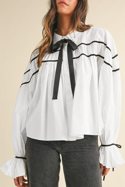 White Long Sleeve Flowy Top with Black Piping and Bow Tie