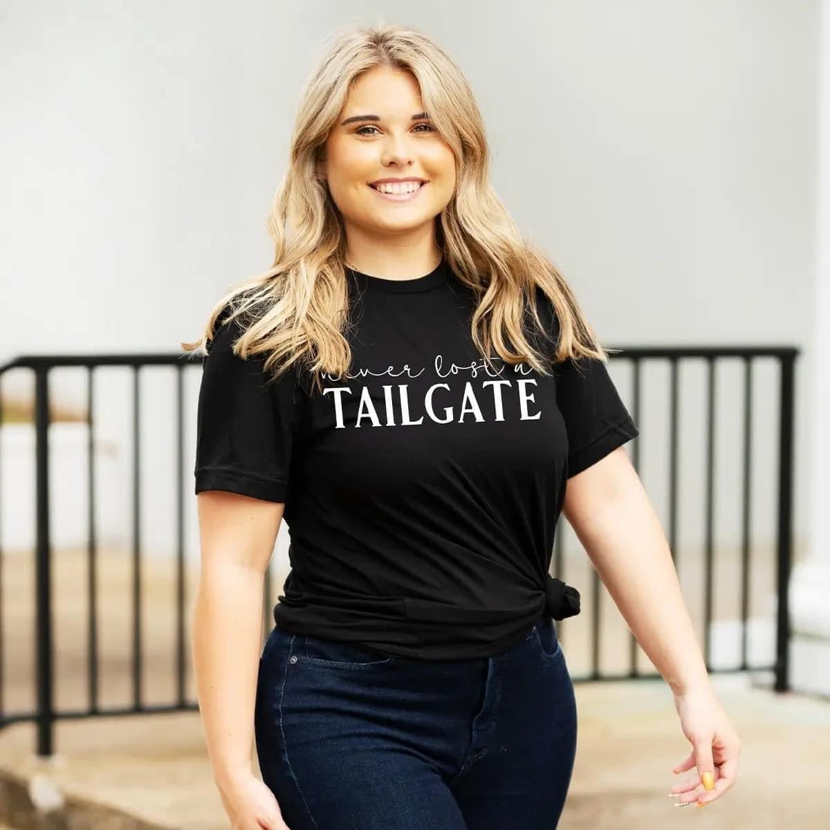 ‘NEVER LOST A TAILGATE’ - Black T-shirt - Football - Sports Mom - Bella Canvas