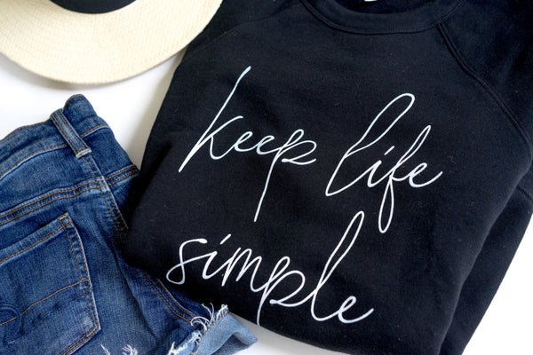 Keep Life Simple-Black-Sweatshirt-Bella Canvas-Script-Quotes-Life-Simple-Minimalist-Love-Adventure-Fall-Autumn-Graphic-Screen Print-Apparel-Women-Men-Unisex fit-Flattering-Super Soft-Comfortable-Long Sleeve-Sweatshirt-Plus Sizes-Love Life